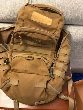 Backpack Military grade med. w built in waterproof cover like new