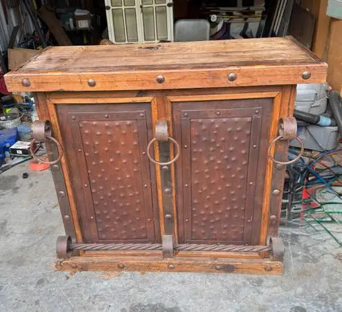Rustic Wooden Bar with Wrought Iron Accents
