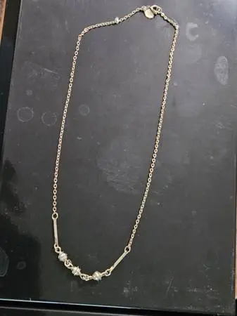 Avon necklace with decorative enclosed pearls