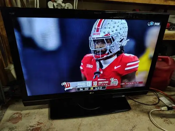 47 inch LG TV w/ a brand new 4K Roku Streaming Stick Plus