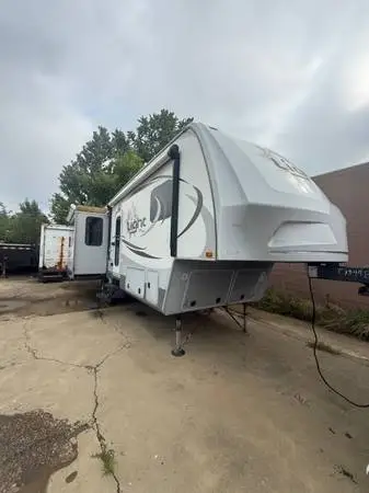 2013 light by Openreach 5th wheel