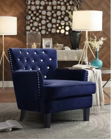 Blue velvet accent chair with crystals