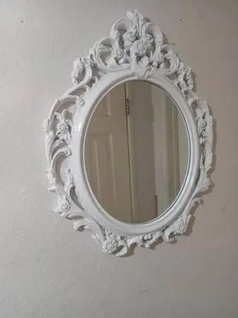 VERY BEAUTIFUL WHITE mirror . PLEASE CALL ASAP BECAUSE THIS MIRROR IS