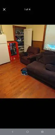 Dark brown sectional and ottoman and recling chair