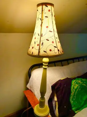 TALL CANDLESTICK LAMP WITH NICE COLORS AND FLOWERS