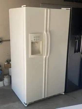 Cream Color GE SIDE BY SIDE REFRIGERATOR