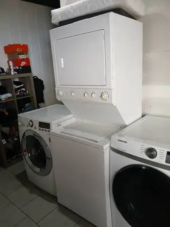 Frigidaire white 27 stackable washer and gas dryer