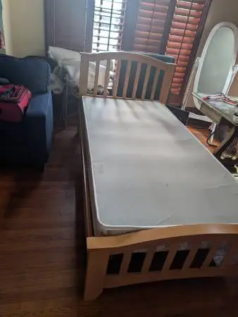 Solid wood bedroom set. Almost new mattress