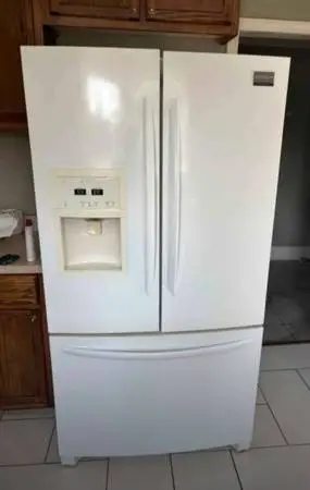 Frigidaire refrigerator sold as is in good condition  needs freon to work again