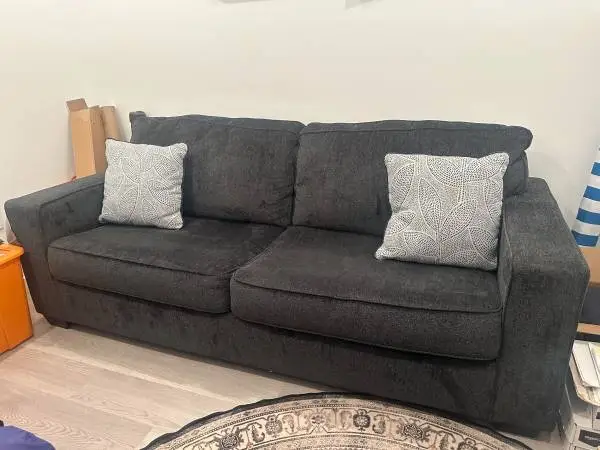 Barely used pullout couch from Ashleys Furniture