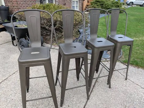 Set of four metal barstools
