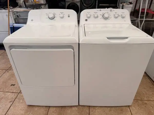 Ge white top load washer and gas dryer