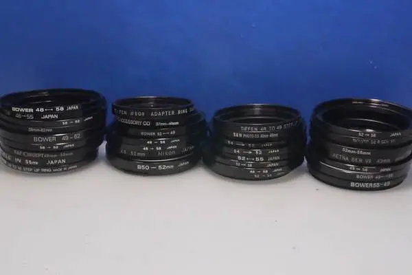 Set of 40 Adapter Rings and 6 Camera Hoods from Several Brands