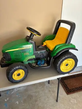 John Deere Tractor Riding Toy. Includes battery and charger.