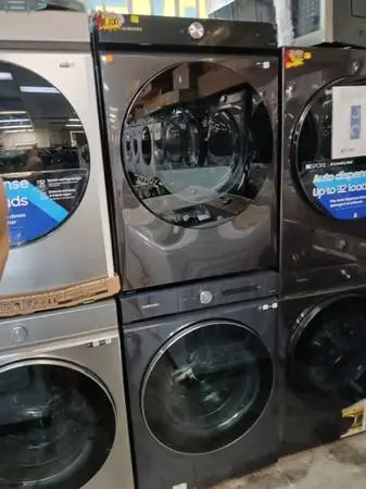 Samsung 5.3 cu ft Steam front load washer and gas dryer