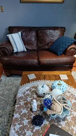 leather couch and loveseat