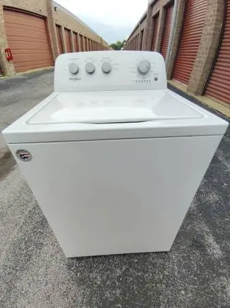 WHIRLPOOL KING CAPACITY WASHING MACHINE.