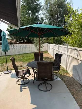 Excellent condition Outdoor Patio Furniture - two coffee tables, umbre