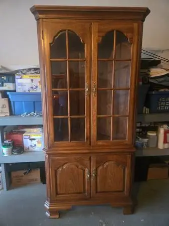 IThomasville lited corner cupboard U.S.A.