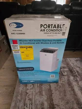NEW IN BOX PORTABLE AIR CONDITIONER AND HEATER