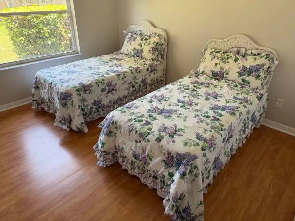 Two twin beds mattress frame sheets wicker headboards pillows DELIVER!
