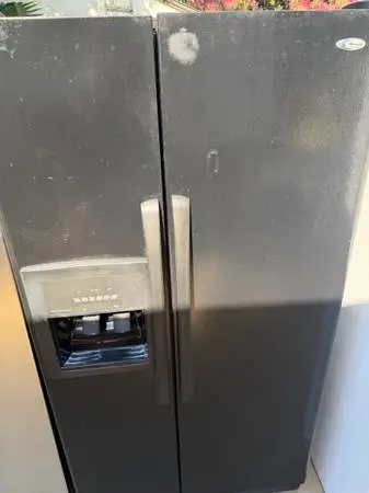 Black Amana refrigerator will deliver