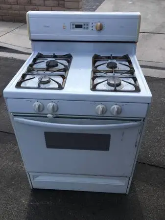 Good and working -AMANA 30” Gas Stove / Range in white - delivery available