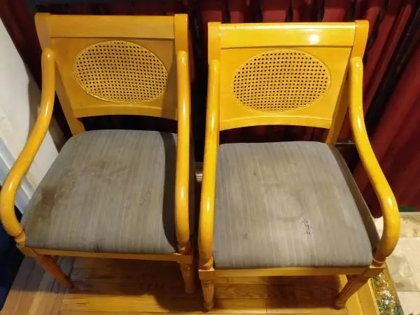 set of two heavy-duty desk chairs that are in need of reupholstery