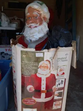 Moving and singing standing Santa