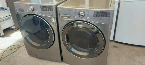 LG Steam Front Load Washer And Gas Dryer