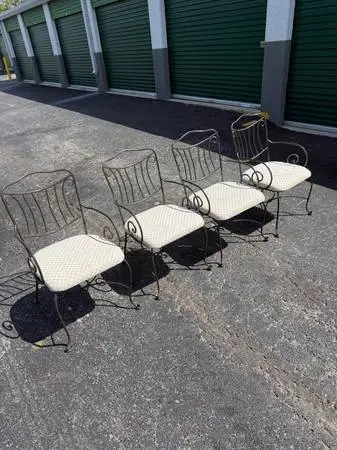Set Of Four Wrought Iron Chairs.