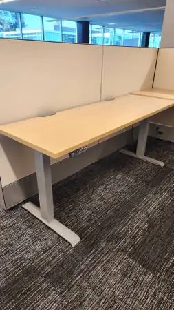 70Wx24D Height Adjustable Desks. 54Wx30D Also Available