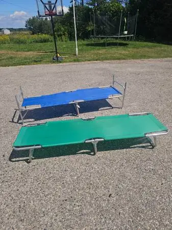 FOLDING COTS FOR THE COTTAGE OR CAMPING OR AT HOME CONVENIENCE $45 (C