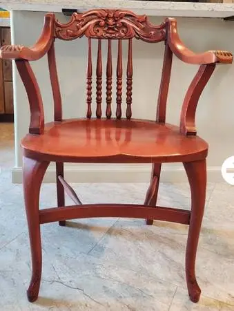 Michigan Chair Company carved antique Northwind armchair