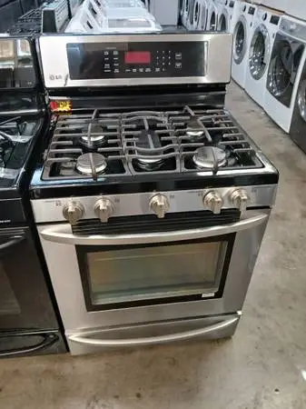 Lg stainless steel 5 burner gas stove with dent
