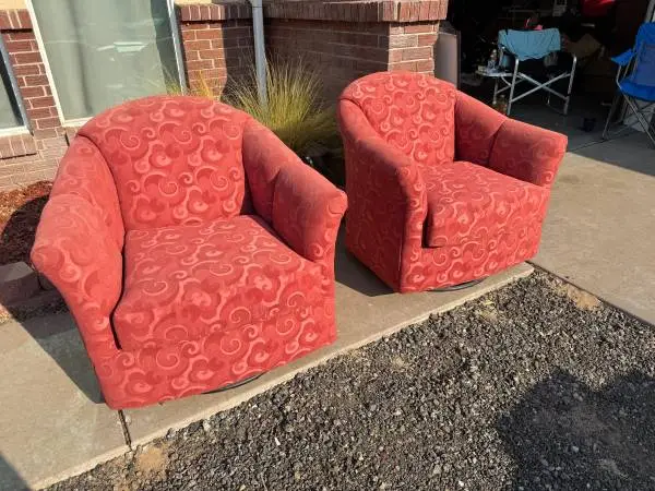 Two swivel rocking chairs