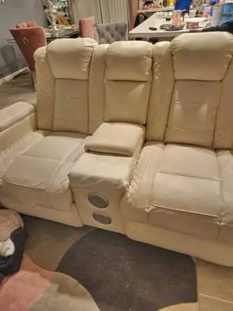 Power 2 seat Leather recliner for sale Cream color