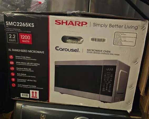 STAINLESS STEEL MICROWAVE COUNTERTOP....2.2 CU....NEW....$ 150