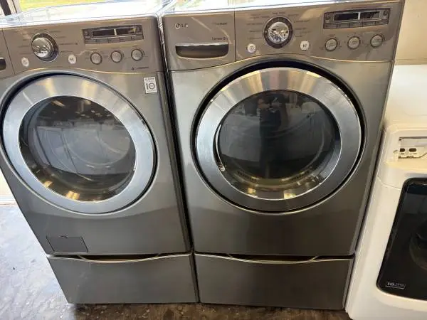 Steam Titanium LG Front Load Washer & Dryer Set on Pedestal