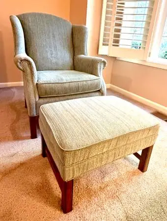 Light green accent chair and ottoman