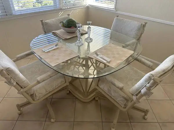 Glass Dining table 46 and  4 comfy swivel chairs
