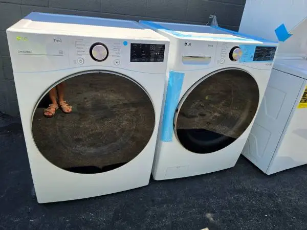 New lg thinq steam white front load washer and gas dryer