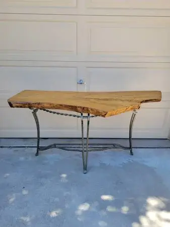 Walnut live edge console table with iron base