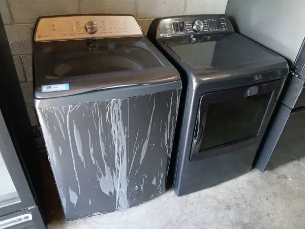 New ge white top load washer and gas dryer