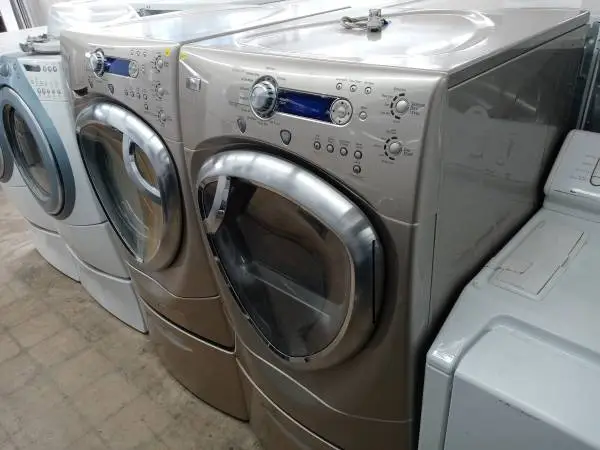 ★GE Profile tan front load washer and dryer set on pedestals