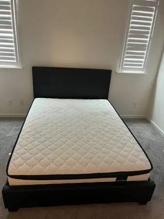 Brand new queen, size mattress, and bed frame