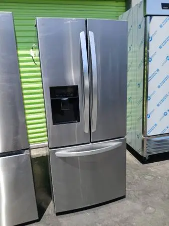 30 lg stainless steel compact French door refrigerator dent