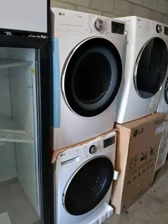 New lg thinq steam white front load washer and gas dryer