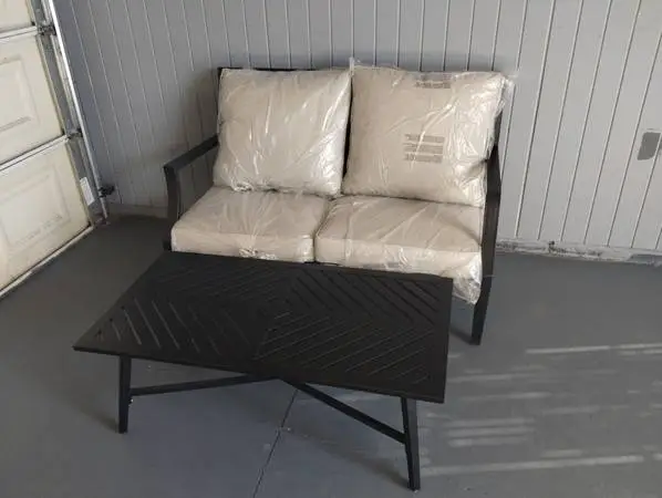 Outdoor patio sofa with coffee table