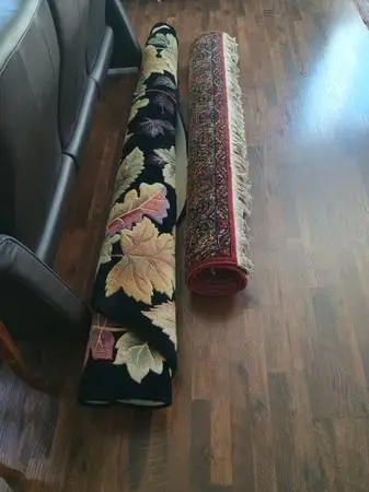 2- 100% wool floor rugs, each